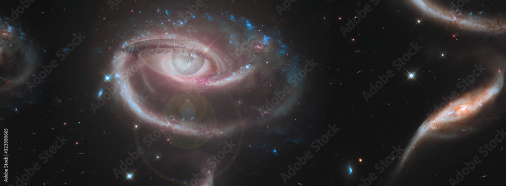 The concept of clairvoyance. A piercing look into the future against the starry sky. Paranormal abilities, clairvoyance, divination. Elements of this image are provided by NASA. Banner. - obrazy, fototapety, plakaty 