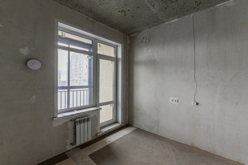 Russia, Moscow- October 17, 2019: interior room apartment rough repair for self-finishing. interior decoration, bare walls of the room, stage of construction