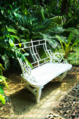 Wall Mural - white bench in the tropical park