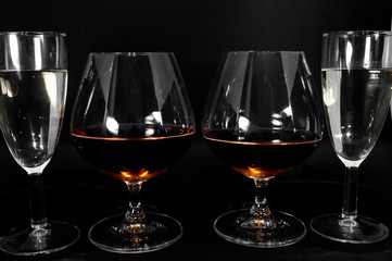 Wall Mural - Glasses with different drinks brandy, whiskey, champagne or bourbon