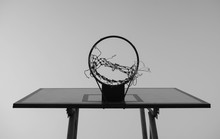 Black And White Tone Of Old Basketball Hoop On Sky Background In The Public Stadium.