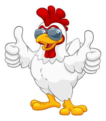 Sticker - A chicken rooster cockerel bird cartoon character in cool shades or sunglasses giving a double thumbs up