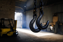 Steel Chain Hook Of Electric Hoist. Industrial Background. Crane Cargo Hook.