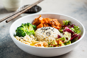 Canvas Print - Vegan rice and vegetables salad. Macrobiotic set with rice, hummus, avocado, broccoli and sweet potato.