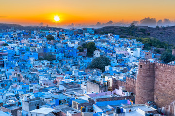 jodhpur, the blue city, rajasthan, india, blue houses at sunset in jodhpu.