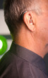 © edwardolive - Man with hearing aid