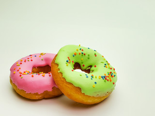 two donuts for Breakfast on isolated white background.