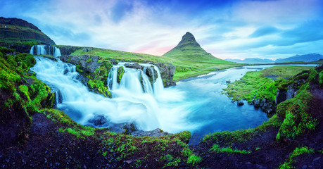 gorgeous landscape with kirkjufellsfoss waterfall and kirkjufell mountain, iceland, europe.
