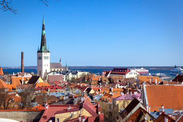 Wall Mural - Panoramic view, aerial skyline of Old City Town, Toompea Hill, St. Olaf Baptist Church, architecture, roofs of houses and landscape, Tallinn, Estonia.