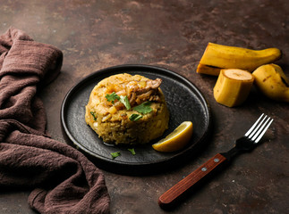 Mofongo, mashed  boiled plantains with porc meat, onion. Puerto Rico.  Amazonian cuisine, Peru, Cuba, Fufu de platano, tacaho