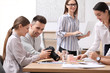 © New Africa - Team of professional journalists working in office