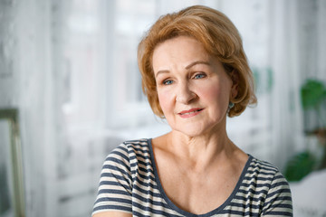 Canvas Print - Portrait of a beautiful Mature woman in close-up