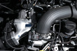 © New Africa - Closeup view of engine bay in modern car