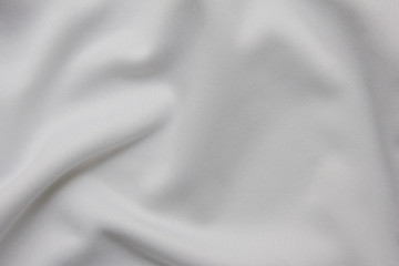 Wall Mural - Linen white fabric texture of crumpled bed sheets. Light bedding cloth background, cotton wrinkled material pattern, close up top view of used bedsheet 