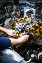 Car Repair: Overhaul Of The V6 Engine With Detailed Pulleys And Parts.