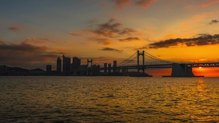 Wall Mural - Time Lapse 4k  Gwangan Bridge and Haeundae at Sunrise, Busan City, South Korea