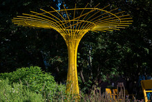 Yellow Steel Wire Sculpture In Park