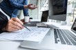 © Thitiphat - Professional Team of programmer working on project in software development computer in IT company office, Writing codes and data code website and coding database technologies on new Application