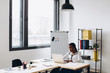 © anatoliycherkas - Pretty african american business woman working on laptop in office