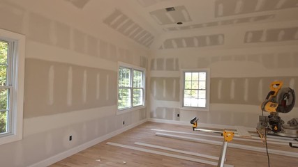 Canvas Print - Interior construction of housing project with new home construction interior drywall and finish detailsinstalled construction materials