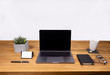 Table shot desk view with pencil a plant, coffee, workspace, business, laptop display and notes business card