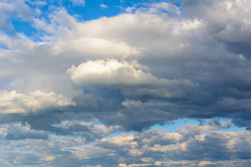 Beautiful sky with heavy, rainy clouds. Bright clouds.