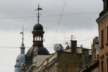 Wall Mural - Riga, May, 2008, Old brick houses with towers and many TV antenas on the roof