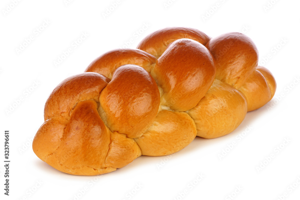 Fresh braided egg bread. Side view isolated on a white background. - obrazy, fototapety, plakaty 