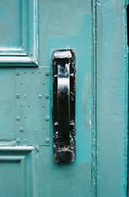 Old Wooden Blue Door With Black Rusting Door Handle