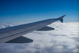 Fototapeta Niebo - flight above the sky wing view