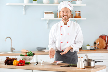 Sticker - Male chef with prepared dish in kitchen