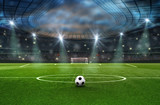 Fototapeta Sport - ball on the green field in soccer stadium. ready for game in the midfield