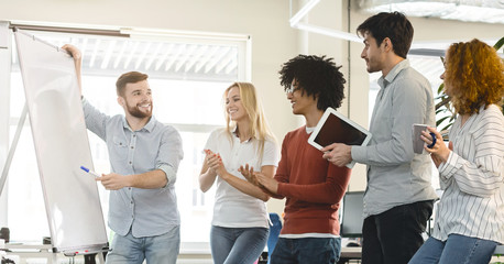 Wall Mural - Professional young team discussing new project in office