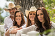 © MACO - Cowboy family all leaning on a fence. Bridger, Montana, USA