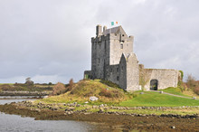 Dunguaire Castle In Ireland With Cloudy Sky