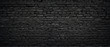 © Günter Albers - Perfect black brick wall as background or wallpaper or texture