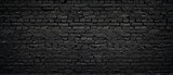 Perfect black brick wall as background or wallpaper or texture