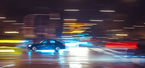 Canvas Print - Blurry car panning