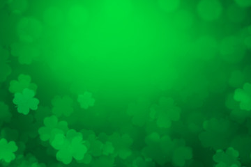 Poster - ST Patrick's day background green clover leaf bokeh lights defocused for ST Patrick's day celebration design background