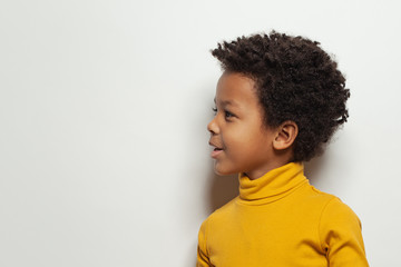 Wall Mural - Cute black kid boy, child face profile portrait