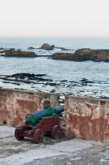 Wall Mural - Defensive wall cannons at Essaouira, Morocco