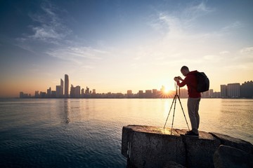 Wall Mural - Photographer at sunrise