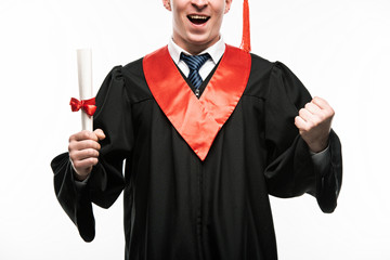 Wall Mural - Front view of happy student with diploma isolated on white