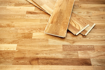 Parquetry, engineered click system oak wood flooring in a freshly renovated room