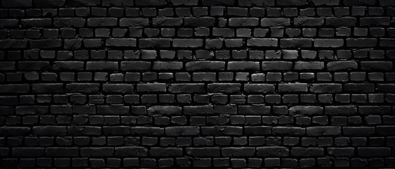 Wall Mural - texture of a perfect black brick wall as background or wallpaper