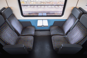 Swiss train interior. Train seats. Comfortable train chairs