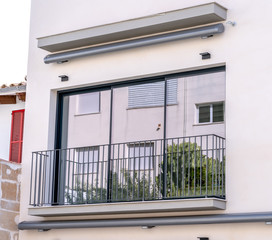 facade of building with windows and shutters