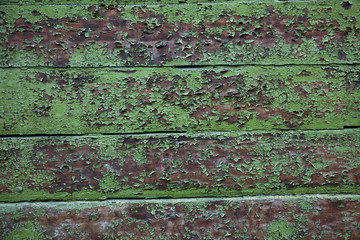 Wood background with peeling paint