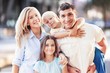 © BillionPhotos.com - Beautiful smiling lovely family on outdoor background