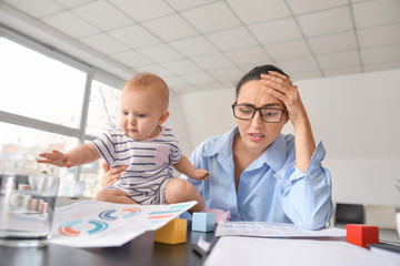 Poster - Stressed mother with her baby working in office